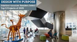 Hospital visitors enter a lobby with large windows, semi-transparent murals, and a pair of giraffe sculptures, complemented by muted green, blue, and orange seating Hospital visitors enter a lobby with large windows, semi-transparent murals, and a pair of giraffe sculptures, complemented by muted green, blue, and orange seating