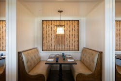 Stillwater restaurant interior at The Lodge at Pebble Beach featuring maritime-inspired materials and panoramic ocean views. Stillwater restaurant interior at The Lodge at Pebble Beach featuring maritime-inspired materials and panoramic ocean views.