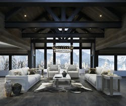 Elegant showroom features heavy timber framing and black steel trusses that are softened through placement of furnishings and accessories in winter whites, against a view of the mountains. Elegant showroom features heavy timber framing and black steel trusses that are softened through placement of furnishings and accessories in winter whites, against a view of the mountains.
