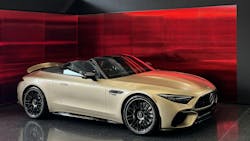 The Mercedes-Benz Showroom in New York, NY, features a fluted red mirror installed with the Z-KISS attachment system. Installation designed and installed by iMBranded The Mercedes-Benz Showroom in New York, NY, features a fluted red mirror installed with the Z-KISS attachment system. Installation designed and installed by iMBranded