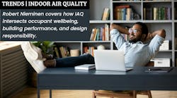 Black male employee enjoys a window view from comfortable office Black male employee enjoys a window view from comfortable office