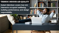 Black male employee enjoys a window view from comfortable office Black male employee enjoys a window view from comfortable office