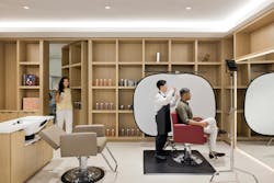 Unilever employees test beauty products in the full-service salon. Unilever employees test beauty products in the full-service salon.