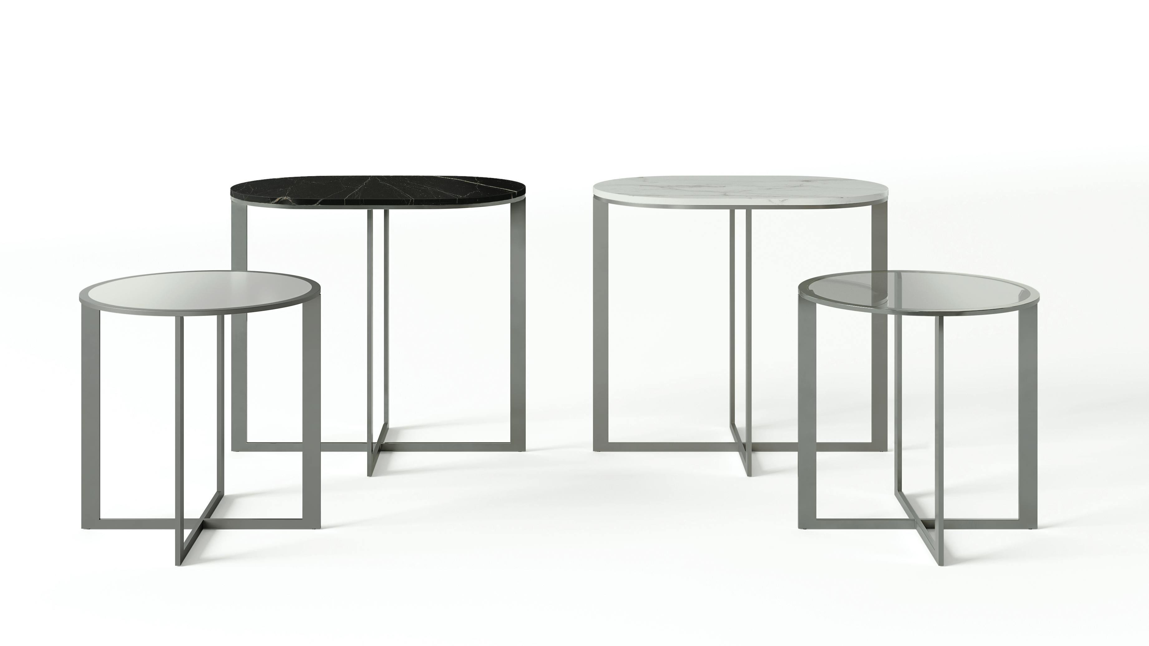 Rialto coffee tables from Rimadesio are offered in oval or round tops paired with a painted metal frame available in all 46 Ecolorsystem finishes, plus metal and nickel grigio.