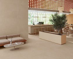 Large format ceramic tile with natural bone and soft tan tones Large format ceramic tile with natural bone and soft tan tones