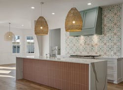 Terracotta hued tile on a kitchen island face Terracotta hued tile on a kitchen island face