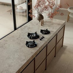 Marble look ceramic slab surface on custom kitchen range-top island Marble look ceramic slab surface on custom kitchen range-top island