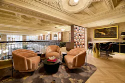 Mezzanine lounges, breakout areas, and a dedicated conference floor incorporate rich wood paneling, metal accents, and plush seating for informal collaboration and formal presentations. Mezzanine lounges, breakout areas, and a dedicated conference floor incorporate rich wood paneling, metal accents, and plush seating for informal collaboration and formal presentations.