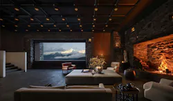 Dark, moody hospitality lounge with comfortable seating and fireplace. Dark, moody hospitality lounge with comfortable seating and fireplace.