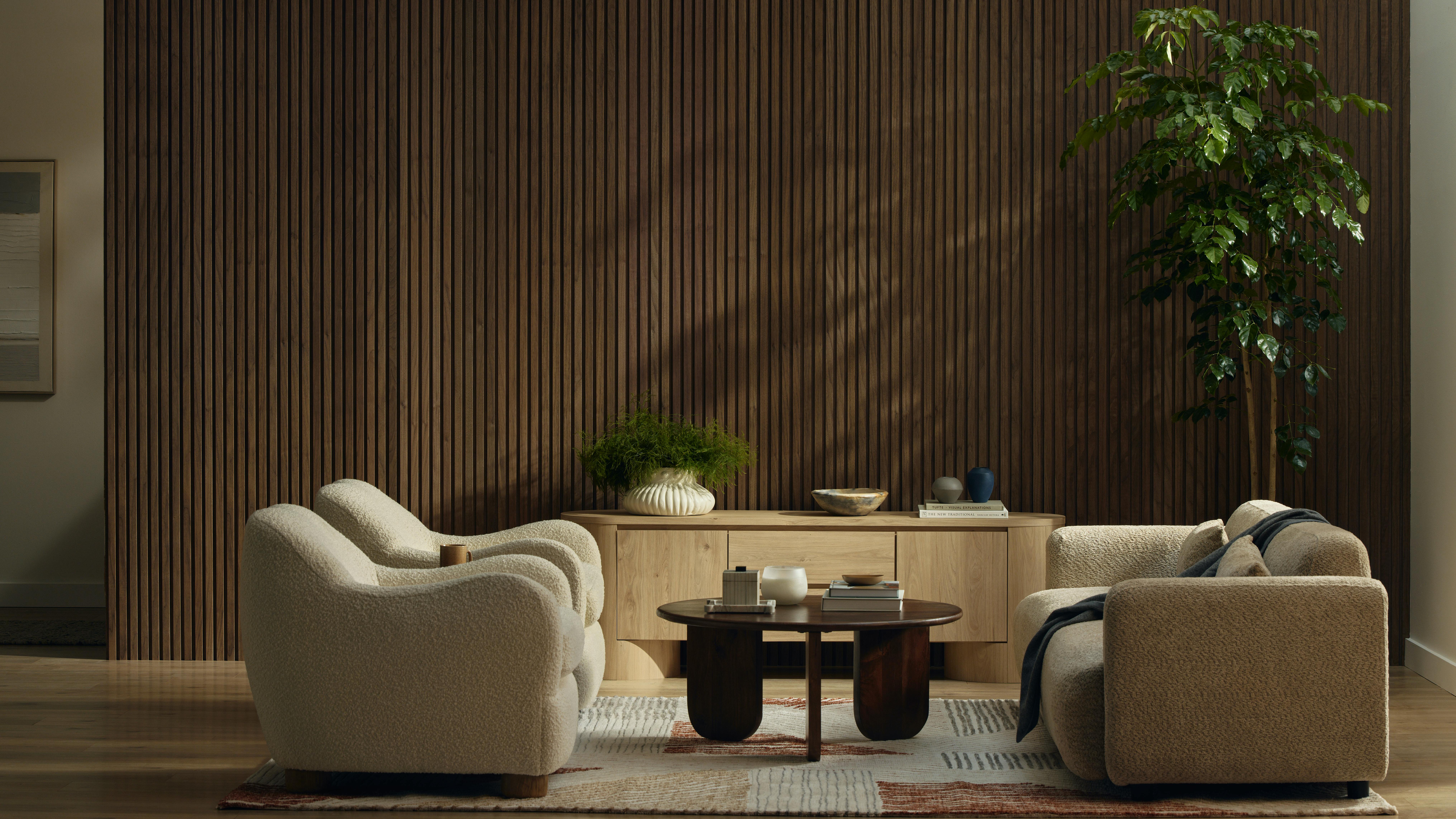 WVH x Drew & Jonathan Home Collection of acoustic slat panels shown in a grain match walnut for a media wall.