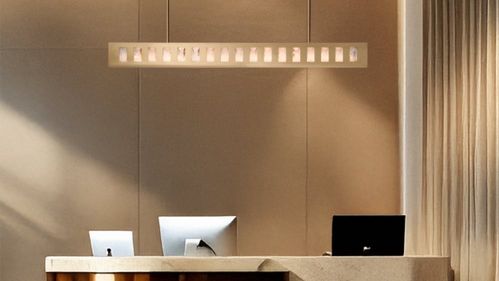 Va Va Voom Linear Short Pendant suspended above a reception desk.