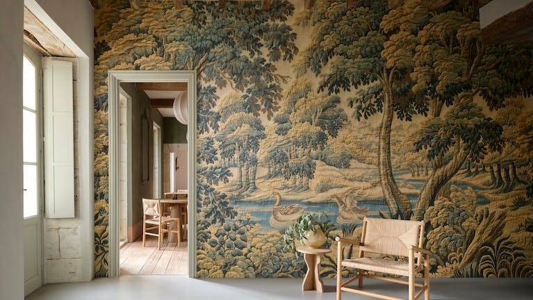 The Bucolique wallcovering reimagines a centuries-old tapestry.