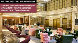 A mix of curved, velvet-upholstered chairs and sofas, green leather look armchairs, and refined bar height seating in the grand, wood and marble surfaced lobby at iQ Offices A mix of curved, velvet-upholstered chairs and sofas, green leather look armchairs, and refined bar height seating in the grand, wood and marble surfaced lobby at iQ Offices