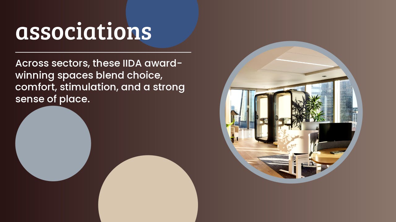 Workplace image shows privacy booths and tables for collaborative work in a daylight-filled office