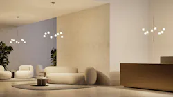 Three Axia sculptural suspension lamps are installed in a lobby. Three Axia sculptural suspension lamps are installed in a lobby.