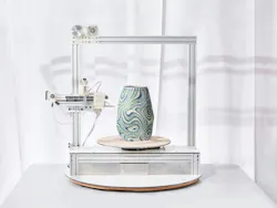 Soft Touch Porcelain Vases are created using a custom-built digital fabrication system. Soft Touch Porcelain Vases are created using a custom-built digital fabrication system.