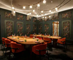 Fleurette semi-private dining room uses custom lighting swags to provide a cozy ambiance alongside the deep jewel tone wallcoverings and finishes and velvet-upholstered chairs. Fleurette semi-private dining room uses custom lighting swags to provide a cozy ambiance alongside the deep jewel tone wallcoverings and finishes and velvet-upholstered chairs.