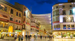 Busy retail district at night.