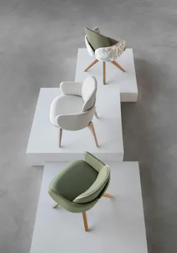 Three tulip-shaped upholstered chairs with different wooden leg configurations, in shades of pale green and cream Three tulip-shaped upholstered chairs with different wooden leg configurations, in shades of pale green and cream