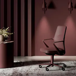 Luxurious looking tall-back ergonomic chair in allover burgundy Luxurious looking tall-back ergonomic chair in allover burgundy