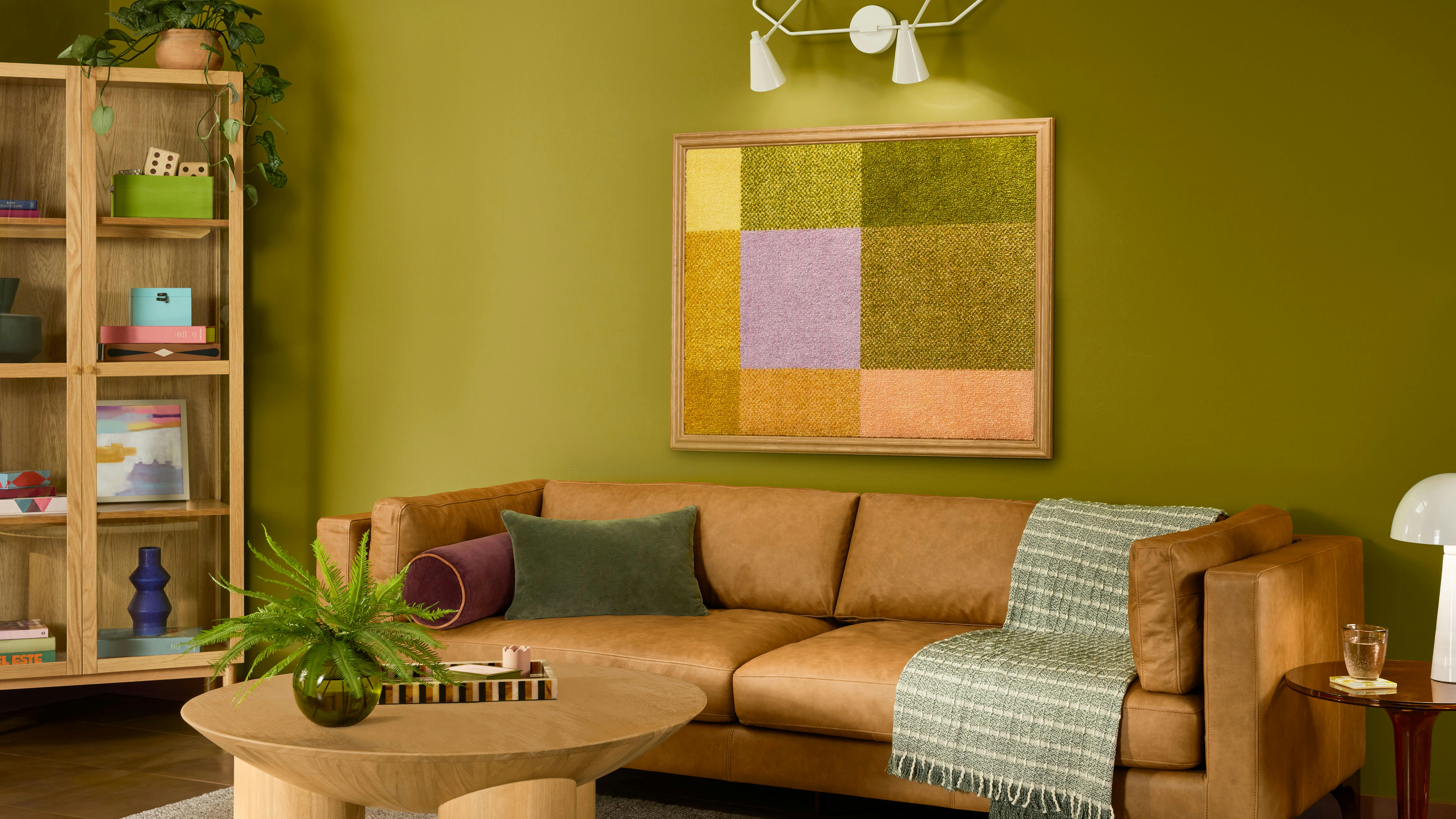 Sherwin-Williams' Offbeat Green painted in a living room.