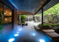 AI generated dry waterfall experiential design uses blue recessed lighting and fog effects