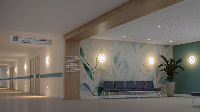 MedMaster Flair luminaire illuminated during nighttime in a hospital.