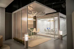Illuminated office and conference room ‘Day’ zones in AWI’s showroom combine visual, thermal comfort, and acoustic elements to create environments that both support focused work and manage energy loads.