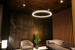As visitors transition to the ‘Night’ side of AWI’s showroom, decorative metal work and deeper wood finishes create a more intimate experience, enhanced by low, layered lighting and sound-reducing materials.