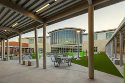 An enclosed courtyard, accessible via the three school wings that surround it, sits at the heart of Legacy Elementary School
