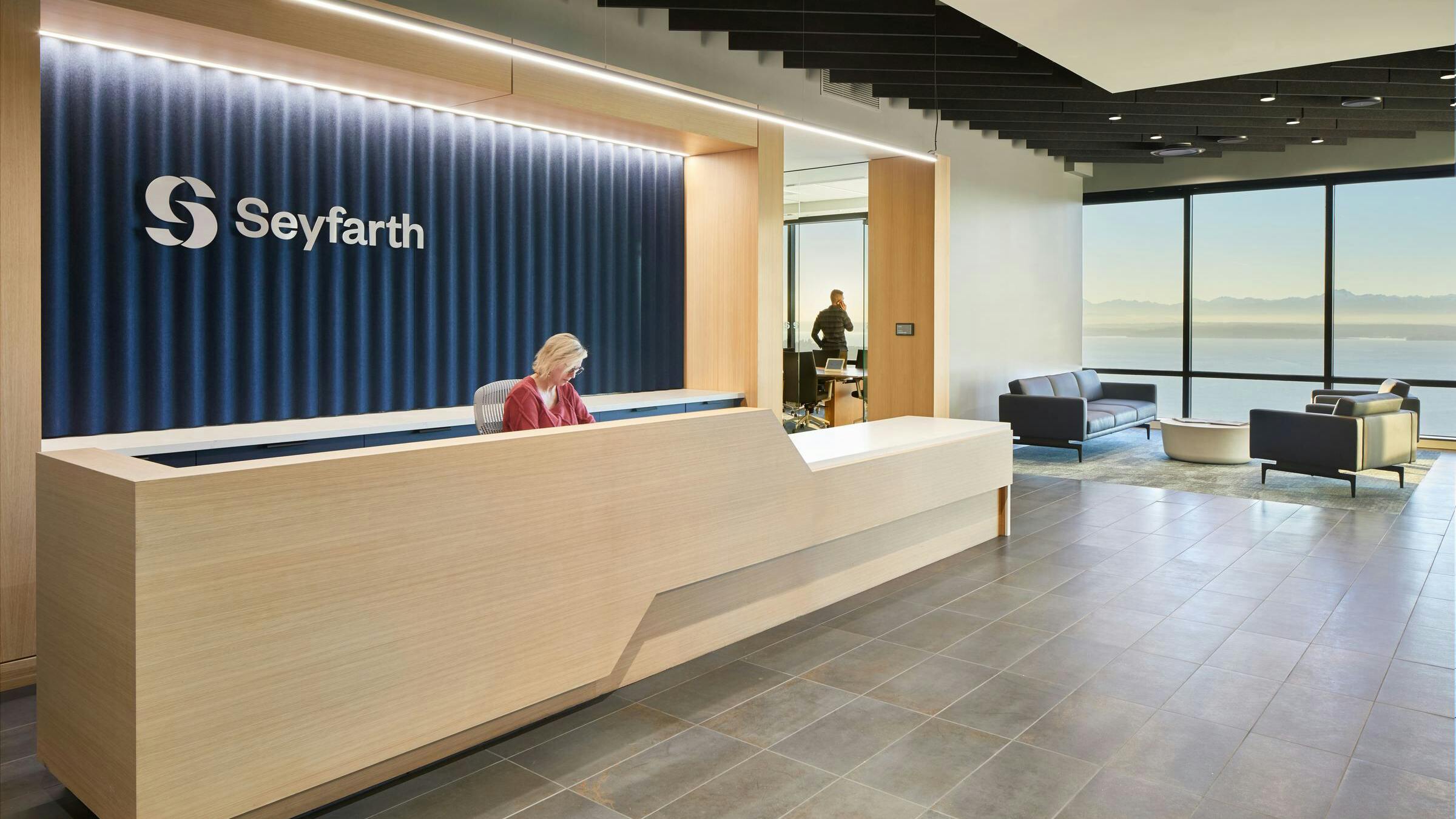 Unika Vaev's Scala Wall Panel is installed at Seyfarth behind a reception desk.