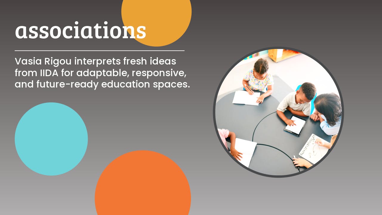 Young students work in a group configuration of movable desks