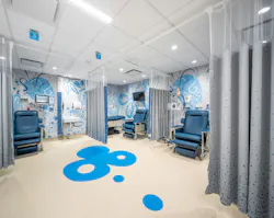 Hospital unit treatment area with blue and gray color-coordinated graphics to help direct patients and caregivers to the right place