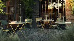 The Lix Portable Outdoor Table Lamp features glare-free illumination and intuitive touch dimming. The portable outdoor table lamps are set on patio tables.