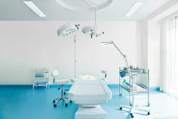 Cool as ice, this classic, solid white cladding is a nonporous surface. Shown in a medical operating room.