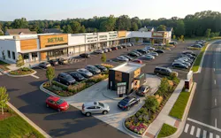 Concept rendering of a convenience-first neighborhood retail center informed by mobility data analysis.