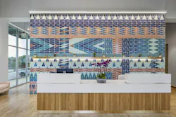 The Right Scalene Triangle Original Ceramic tile is designed for creative wall and floor applications. Shown installed in a reception area.
