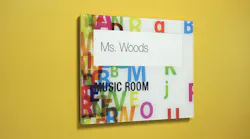Takeform's Inspire signage with a music room label on it for an educational building.