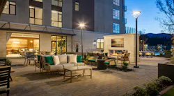 Courtyard with lounge seating, outdoor fireplace, and views of Northern California landscape