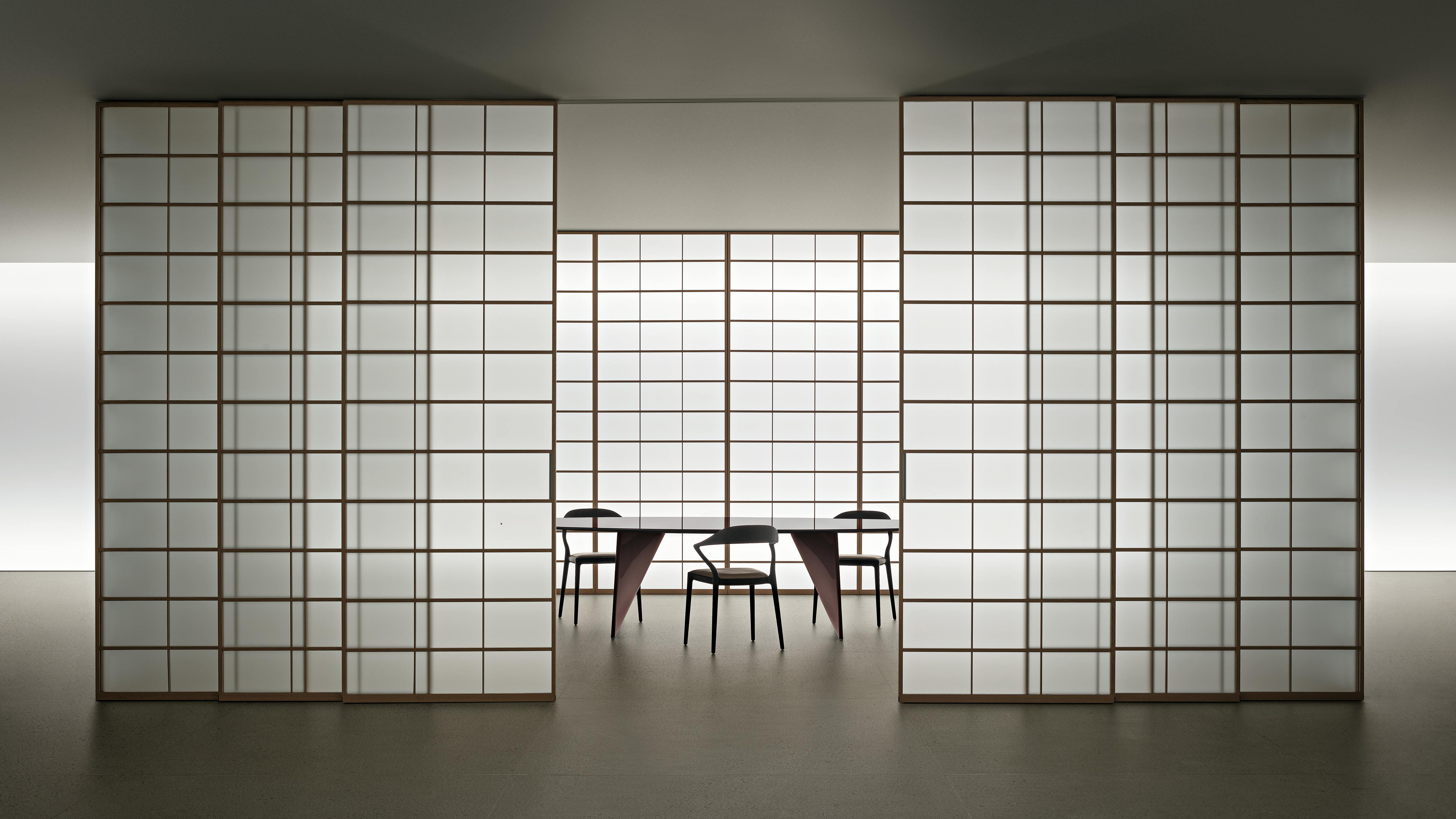 Syncro sliding panels transform room dividers into precise architectural elements.