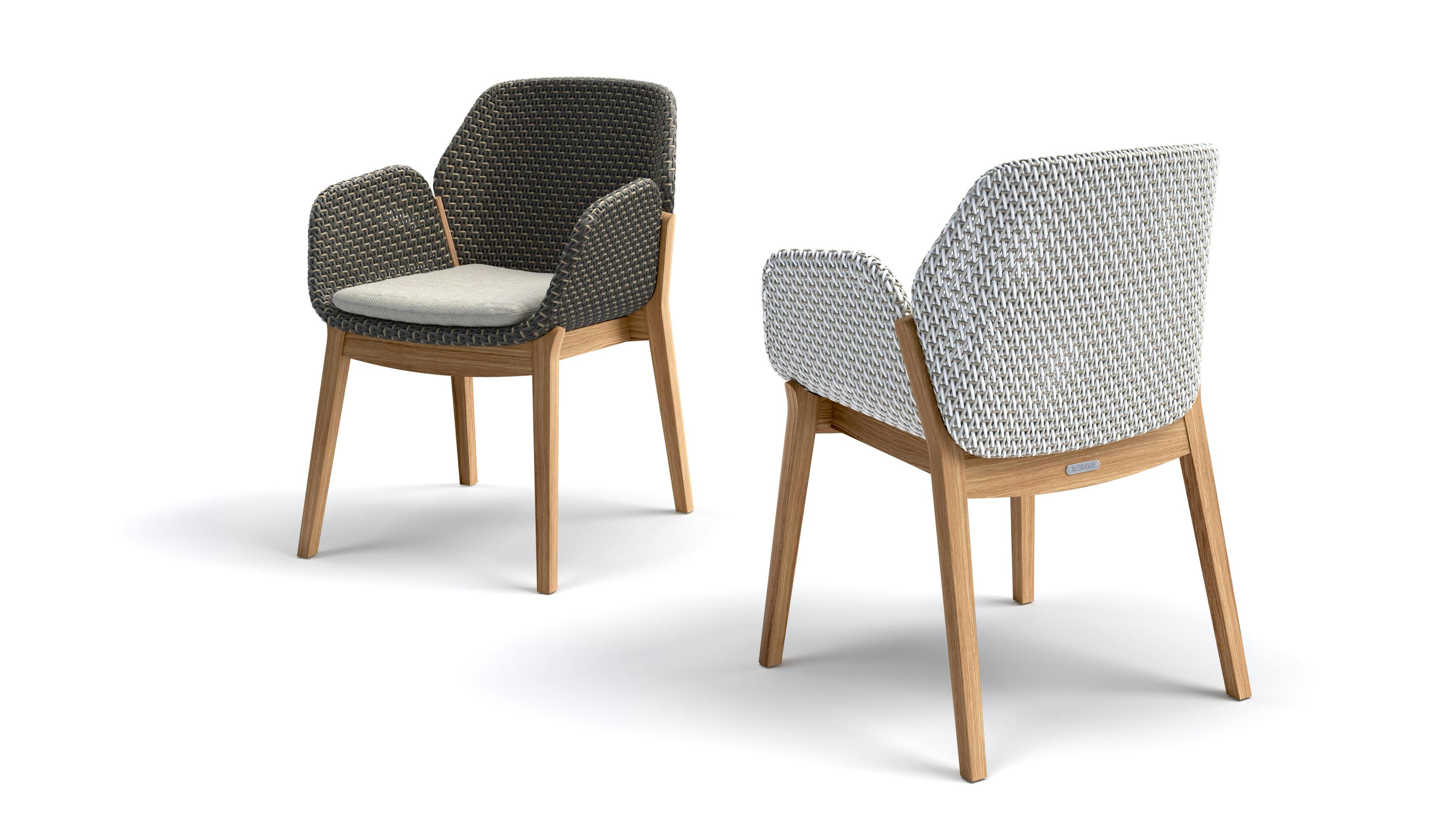 Two CALADIO outdoor chairs feature upholstery and cushions. The chair's inspiration comes from the caladium &mdash; also known as elephant ear &mdash; an exotic Indonesian plant.