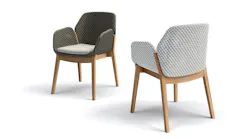 Two CALADIO outdoor chairs feature upholstery and cushions. The chair's inspiration comes from the caladium — also known as elephant ear — an exotic Indonesian plant.