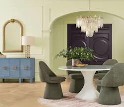 Dining room scene with Celery, a pale yellow-leaning green tone, on the walls, and complementary colors such as plum, artichoke, and gray-tinged blues