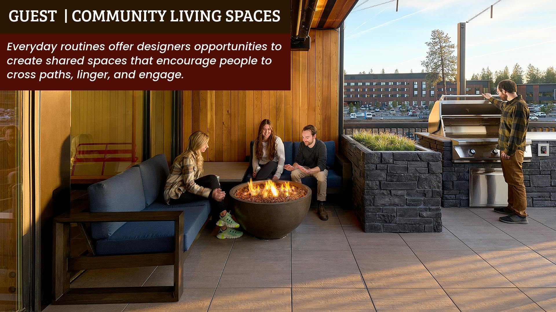 Large stone-paved patio with wooden overhang and firepit, built-in grill, and lounge seating
