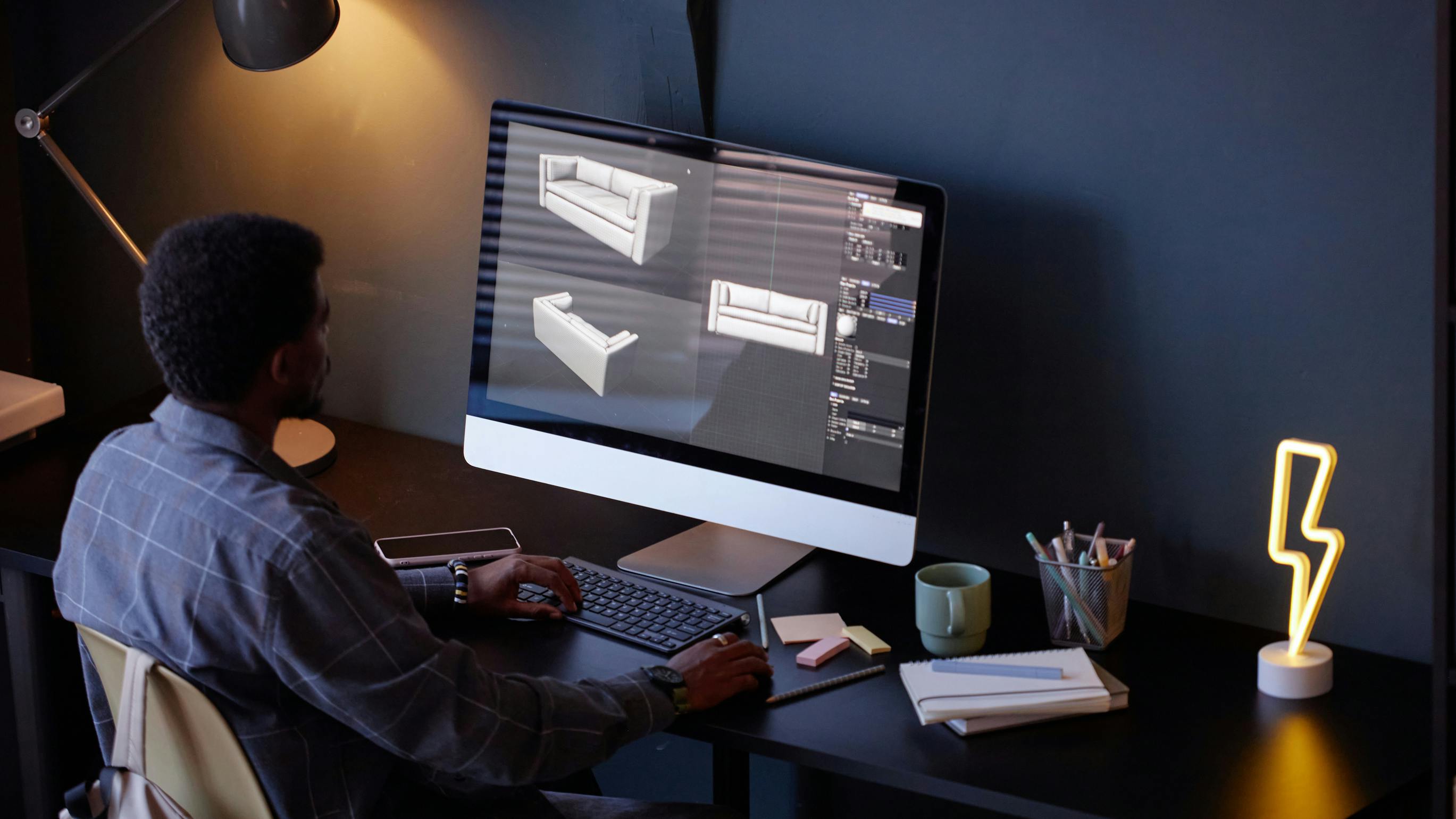 Furniture designer working on CAD