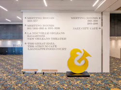 New convention center signage color-coordinates with the adjacent hall