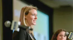 Hightower CEO Natalie Hartkopf presenting at event.